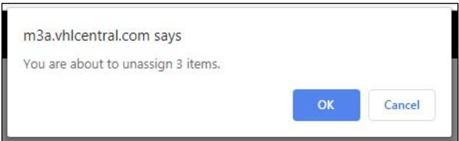 Browser confirmation dialog from VHL Central asking to confirm unassigning 3 items.